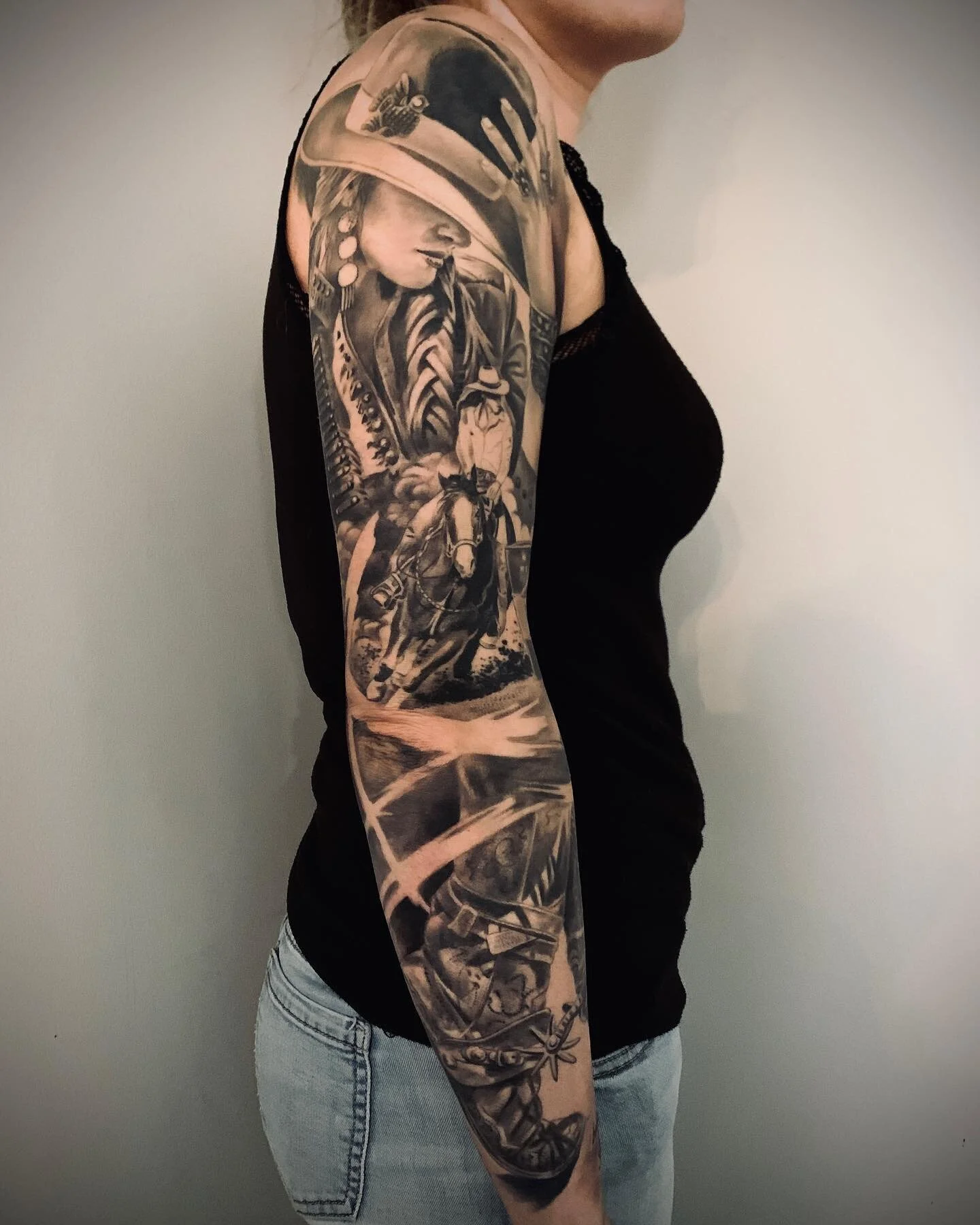 Realistische western sleeve met cowgirl, paard en laars.