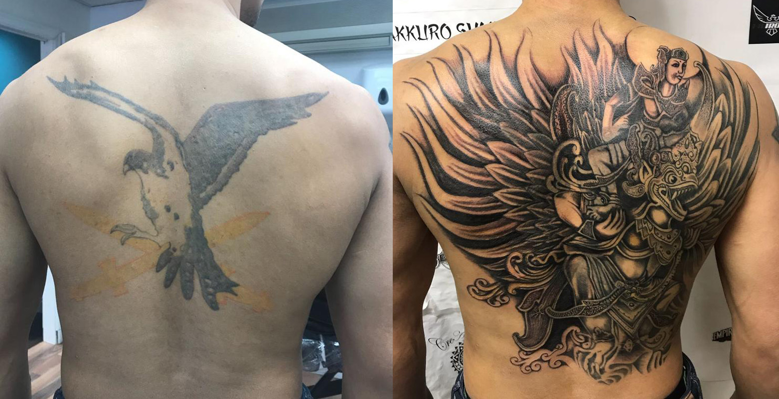 Indrukwekkende cover-up van een oude adelaar met een gedetailleerde Garuda op de rug.