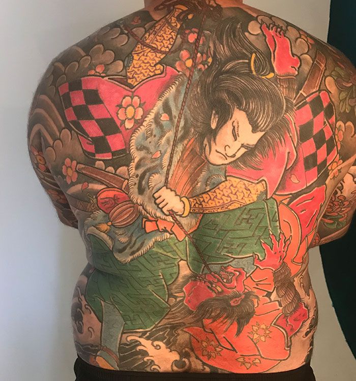 Grote Japanse full-back tattoo van een samoerai die een demon bevecht.